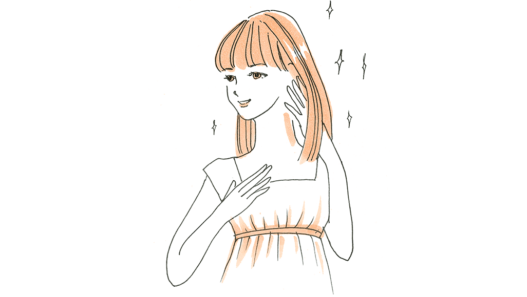 髪を触る女性